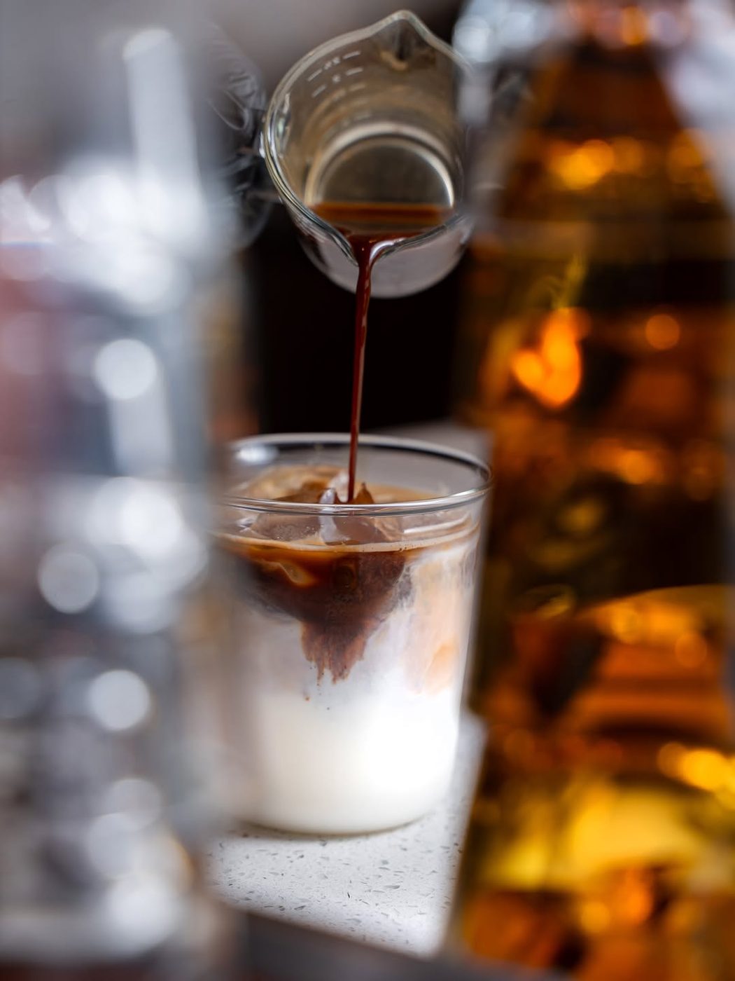 Espresso poured into cold milk