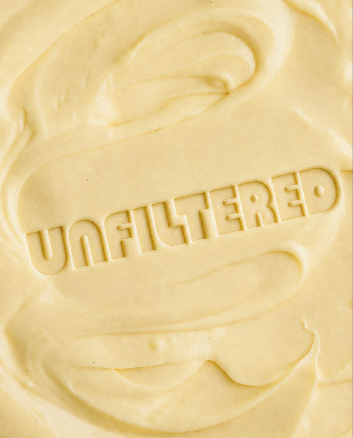 Butter pressed with the word UNFILTERED