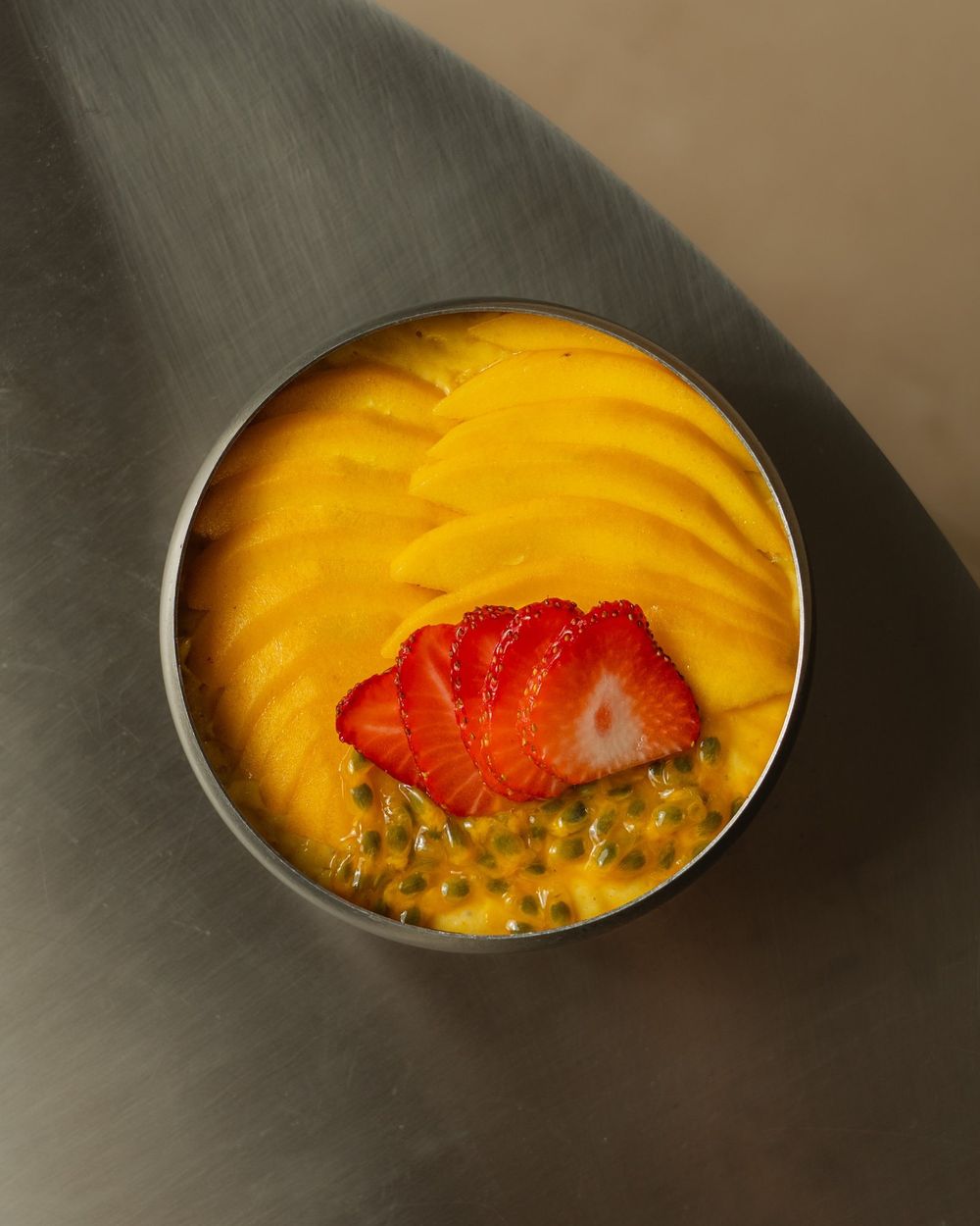 A mango trifle in a glass